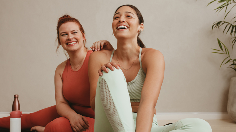 Women enjoying yoga class