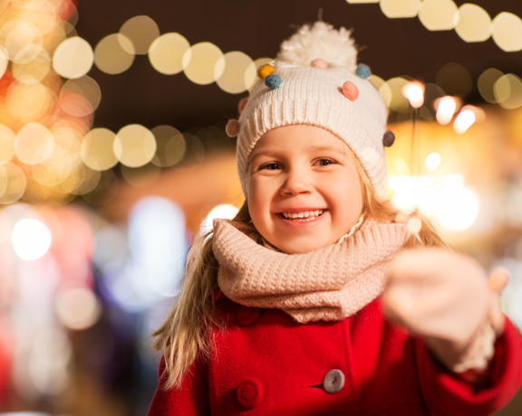 Happy Girl With Sparkler Christmas Market